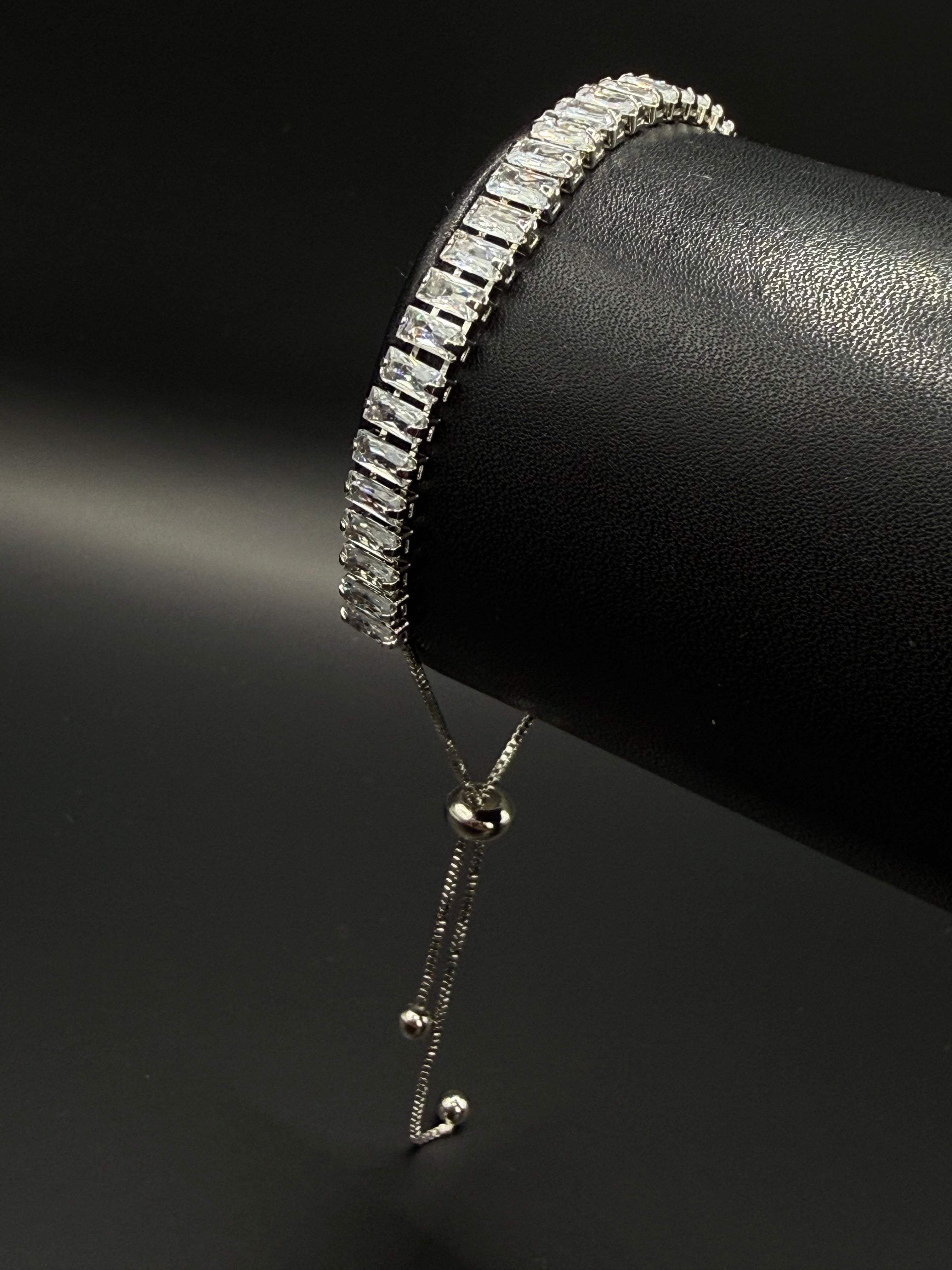 Pulso Baguette Ajustable Zirconias Plateado
